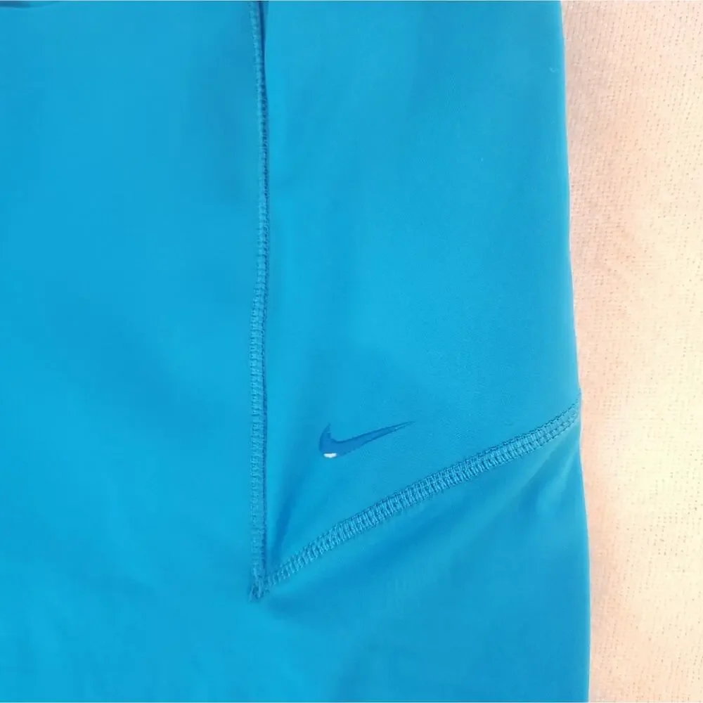 NIKE Dri fit Bungee Detail workout leggings In Aqua Blue XS
